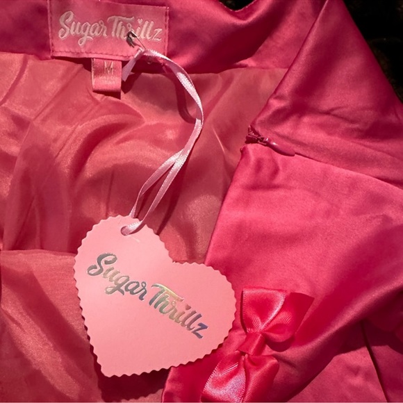 Pleated pink mini skirt - Picture 2 of 4